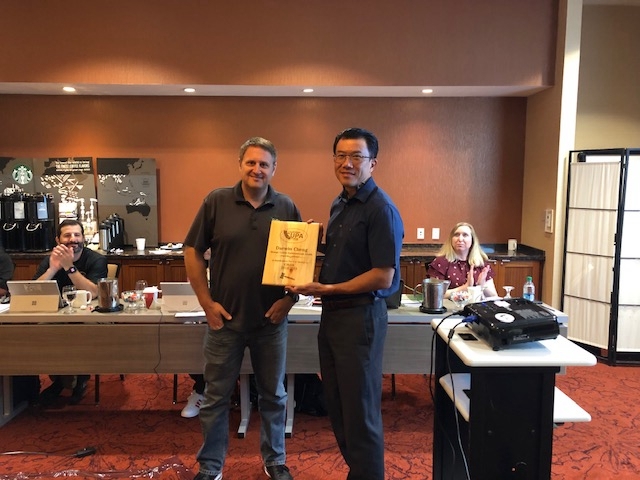 Darwin Cheng receiving his president plaque 2019-08-07